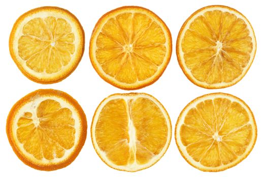 Dried oranges isolated on white background closeup top view