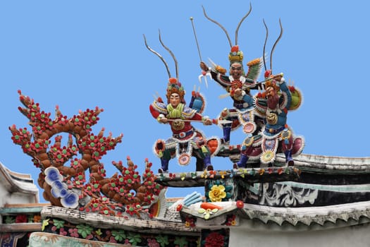 Warriors on a roof of a Vietnamese palace