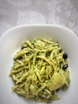 Italian trofie pasta with traditional pesto sauce. Restaurant and food concept