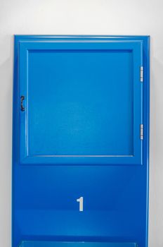 Blue small cabinet door collection with numeral