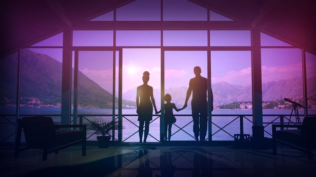 Family on vacation enjoys a beautiful view of the mountains and the lake.