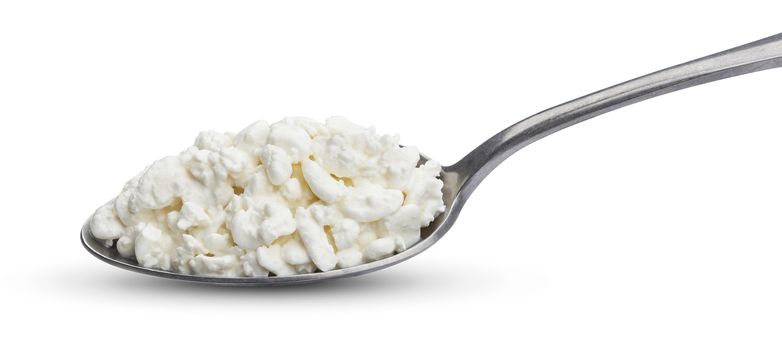 Cottage cheese in metal spoon isolated on white background with clipping path