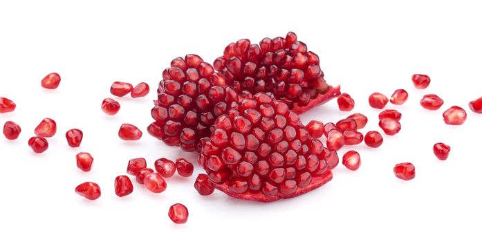Ripe pomegranate seeds isolated on white with clipping path