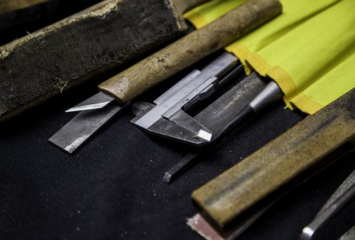 Old tools for carving stone of handmade way, detail of old manual craft