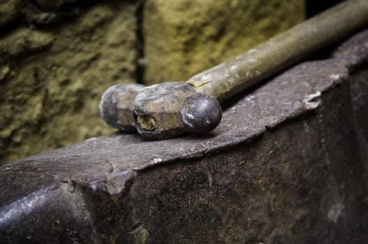 Iron incandescent in an old metal forge, industry detail