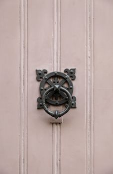 Old metal door knocker, decoration detail