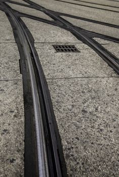 Tram rails in Ghent, detail of urban transport, tourism in Europe