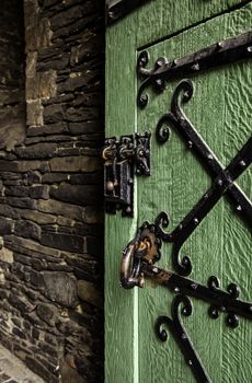 Ancient decorated metallic lock, detail of security and decoration