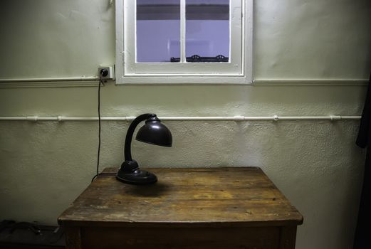 Old lamp on table, studio table detail