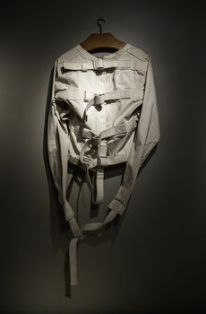 Old psychiatric straitjacket, mental hospital detail, psychosis