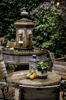 Garden table with pumpkins, decorated terrace detail of halloween