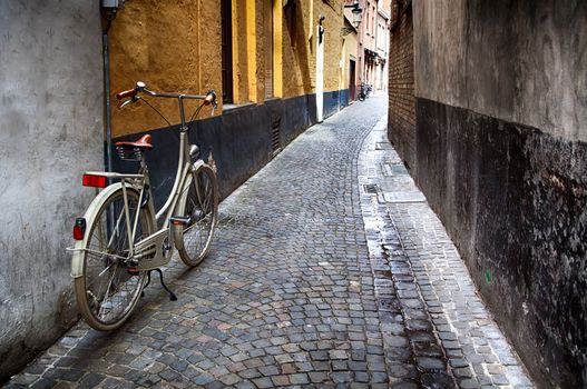 Typical bicycle in Bruges, detail of transport in town, tourism and exploration of the city