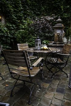 Garden table with pumpkins, decorated terrace detail of halloween