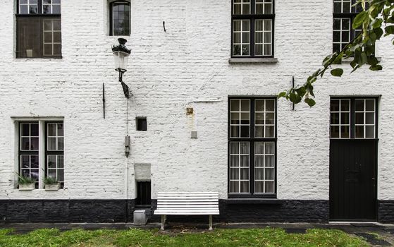 Begijnhof, typical and old district of Bruges, detail of typical Belgian house, tourism in Europe