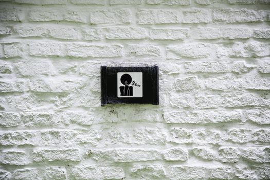 Sign of silence in Bruges, detail of information in the city