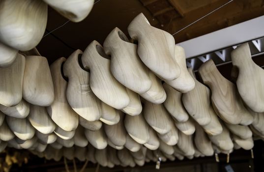Dutch clogs craftsmen, manufacture of traditional footwear for the field