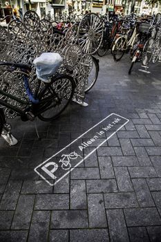 Bicycle parking in Amsterdam, transport detail for people, sport and health