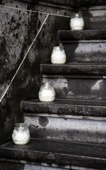 Candles on a staircase, detail of lighting and decoration