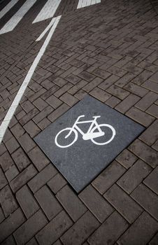 Bicycle signal on the asphalt, transportation detail, information
