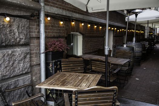 Terrace in amsterdam, detail of tables and chairs in the city