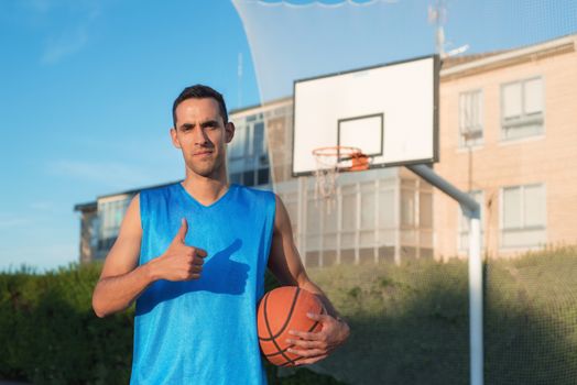 Basketball player with thumb up