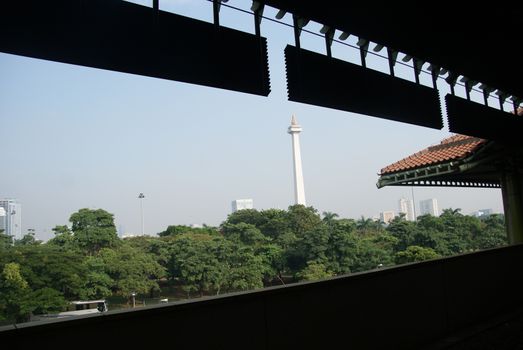 National Monument or MONAS (Monumen Nasional) seen from Gambir Train Station in Jakarta, Indonesia