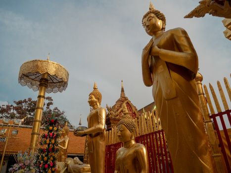 A standing Buddha in Doi Sutep Temple in Chiang Mai Thailand