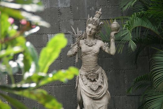 beautiful marble of women statue in traditional indonesian attire