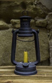 Old candle with wax candle, lighting detail