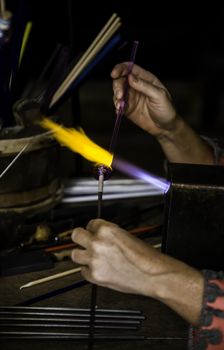 Blowing glass in a traditional way, art detail
