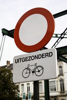Bicycle sign with arrow, detail of information, transport