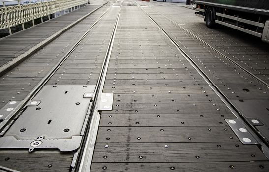 Tram rails in Ghent, detail of urban transport, tourism in Europe