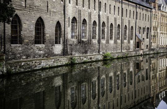 Old canal of the city of Ghent, detail of tourism, Europe