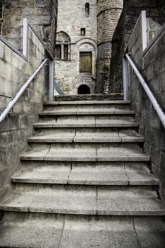 Old stone staircase, detail of medieval steps, history