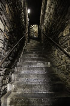 Old stone staircase, detail of medieval steps, history