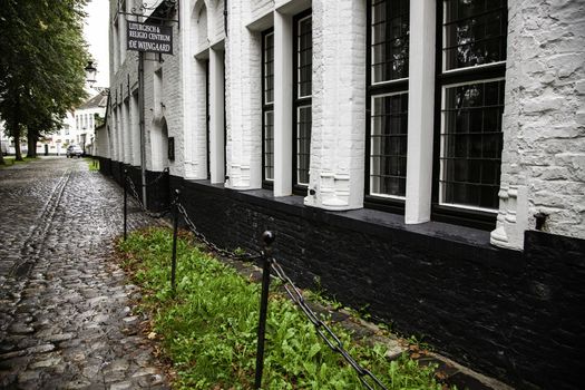 Begijnhof, typical and old district of Bruges, detail of typical Belgian house, tourism in Europe