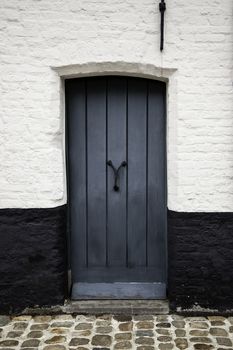 House typical of bruges, detail of medieval houses, tourism in Belgium, Europe