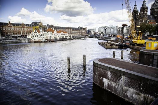 AMSTERDAM, NETHERLAND - SEPTEMBER 06, 2018, Central station building. The building of the Central station is one of the architectural attractions of the city, Netherland on September 06, 2018