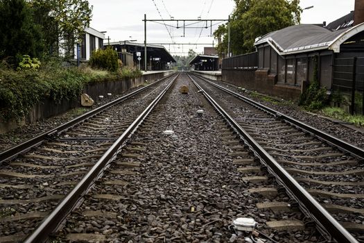 Train tracks in a station, transport detail by rails, trip