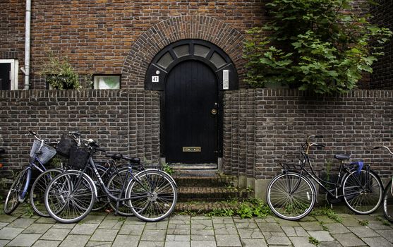 Typical bicycle in Bruges, detail of transport in town, tourism and exploration of the city
