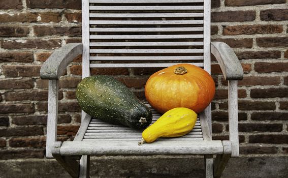 Pumpkins on a chair, Halloween decoration detail