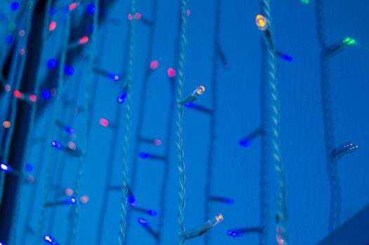 Festive decoration of office buildings, lights electric garland with lights.