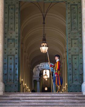 ROME, VATICAN STATE - August 24, 2018: Pontifical Swiss Guard at the entrance of the Vatican State