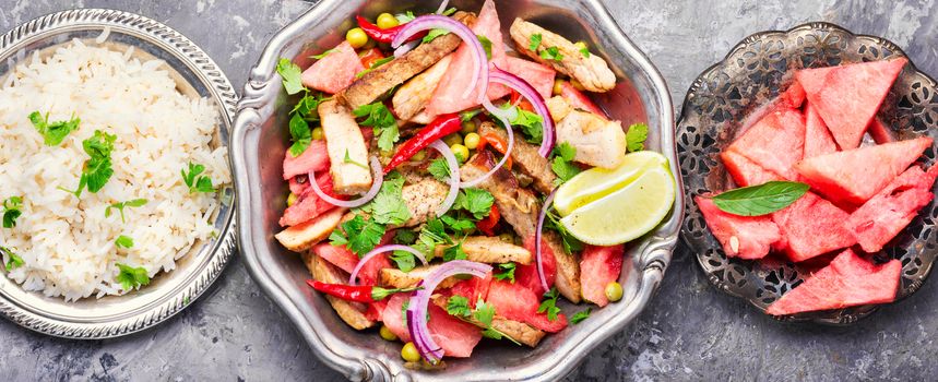 Summer salad with beef steak, watermelon and spices.Exotic food,