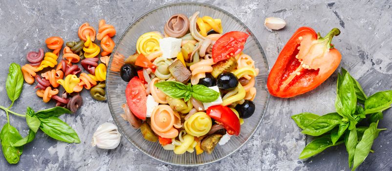 Italian salad with pasta and fried vegetables