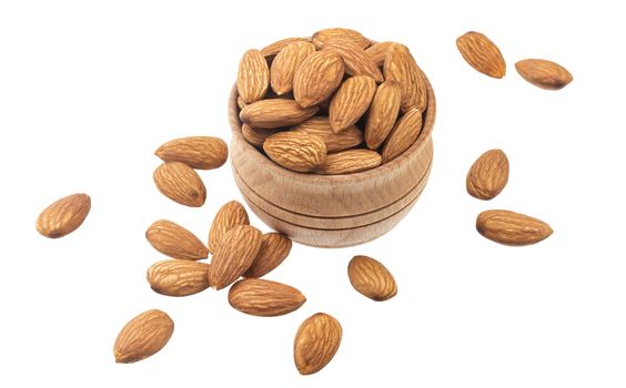 Almond nut in a wooden bowl isolated on a white background with clipping path