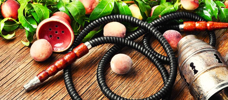 Hookah for smoking with the aroma peach.Peach shisha