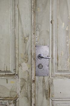 Old white door, detail of a closed door