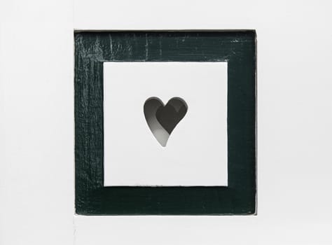 Heart in a wood, detail of a romantic symbol, love