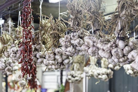 Fresh garlic on a market, detail of raw vegetables